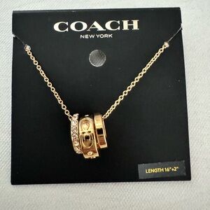 Coach Gold Charm Necklace with Textured Pendants